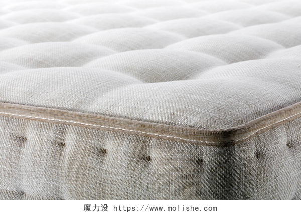 一个舒适的席梦思床垫关闭床垫的白色纹理, 床上用品图案背景